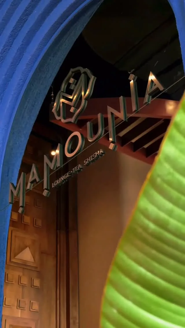 The brass MAMOUNIA sign at the entrance