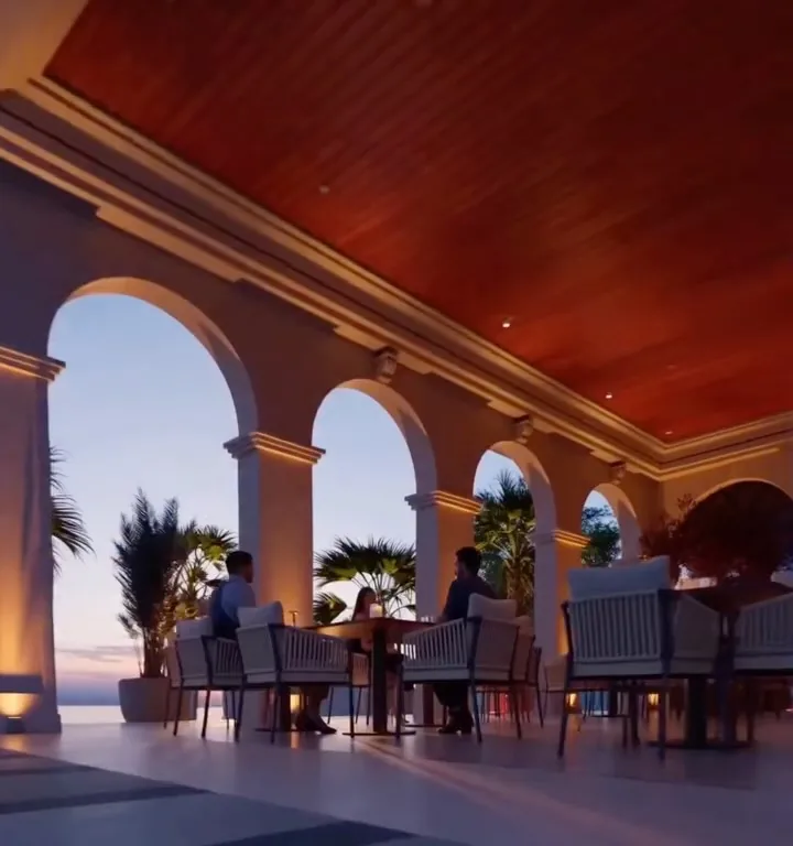 The covered gallery by the sea at dusk
